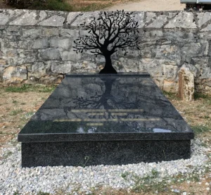 Pierre tombale double en granit noir d’Afrique avec une stèle acier "arbre de vie"